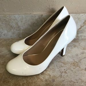 White patent leather heels
